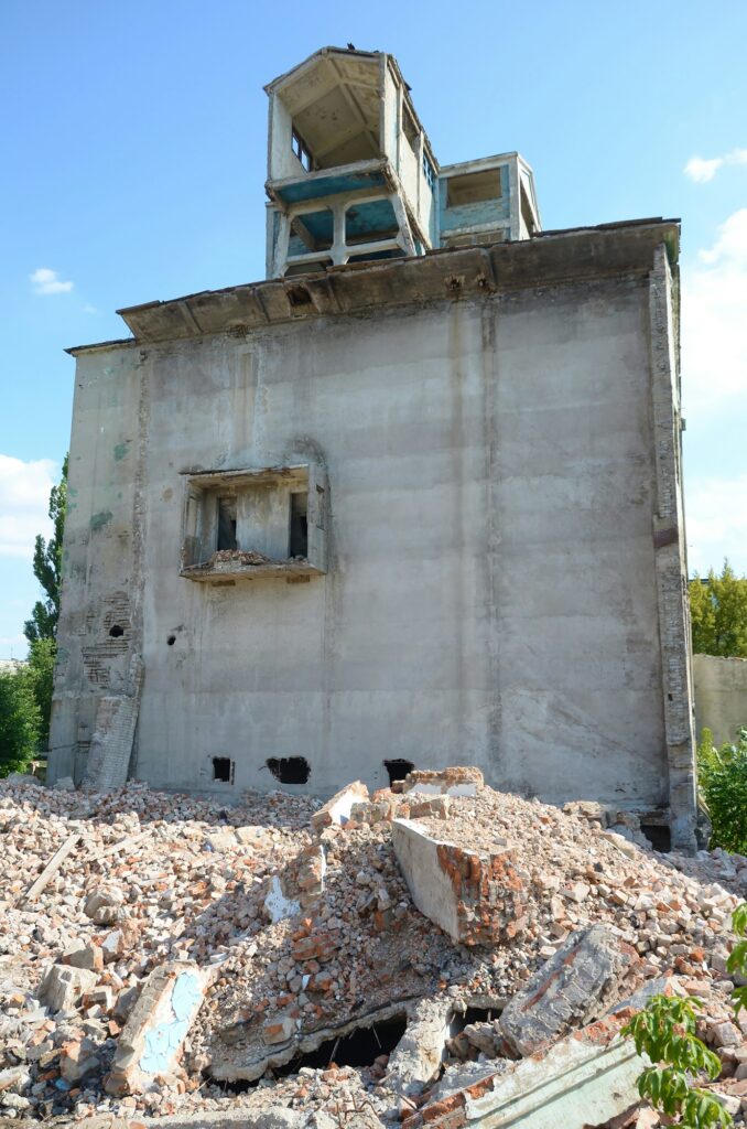 Collapsed industrial multistorey building in daytime