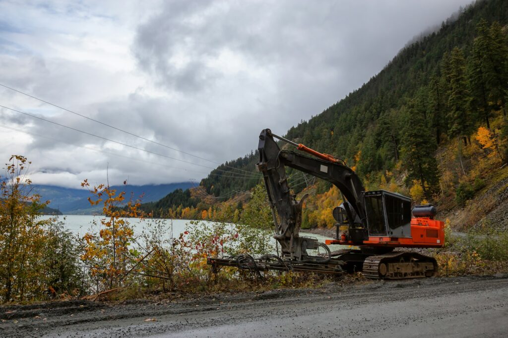 Excavator on the side of In-Shuck-ch Forest Serivce Road